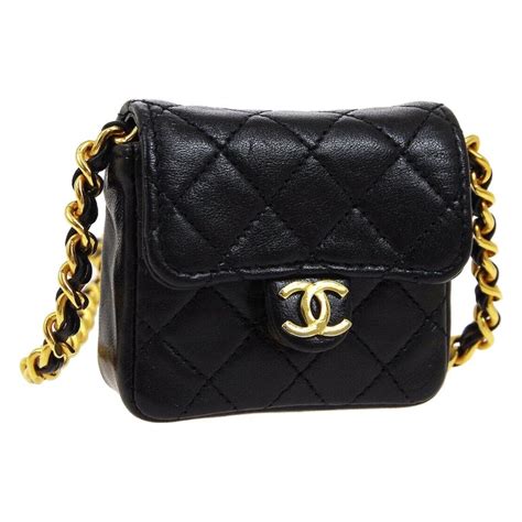 black chanel purse gold chain|black chanel shoulder bag.